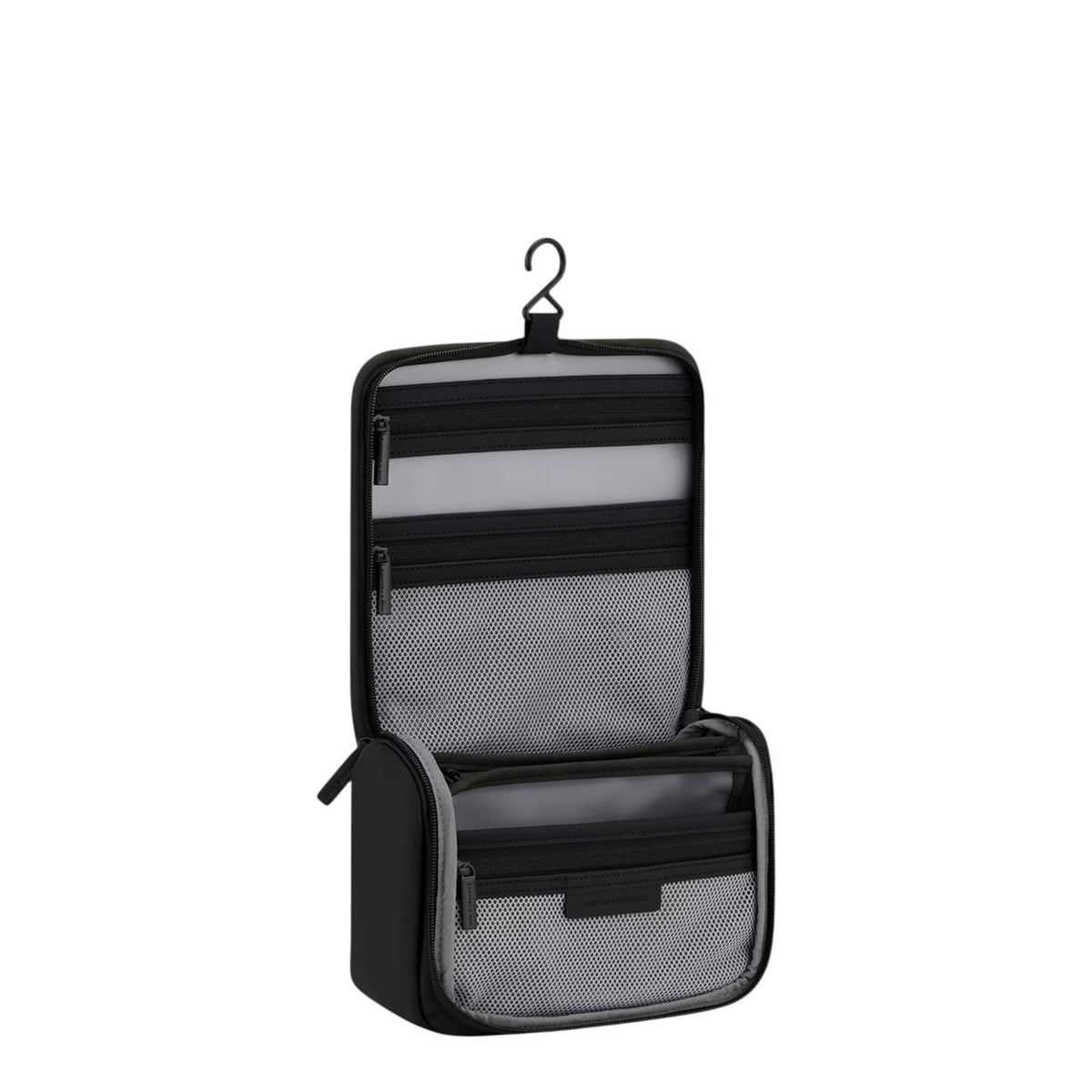 Lieblingstasche Bali washbag in black with multiple internal mesh compartments and a hanging hook for travel