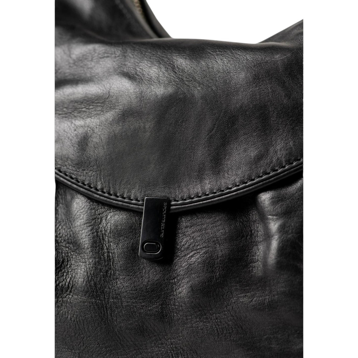 Lieblingstasche Mrs. Banoffee Pie black leather handbag with a minimalist metal clasp closure