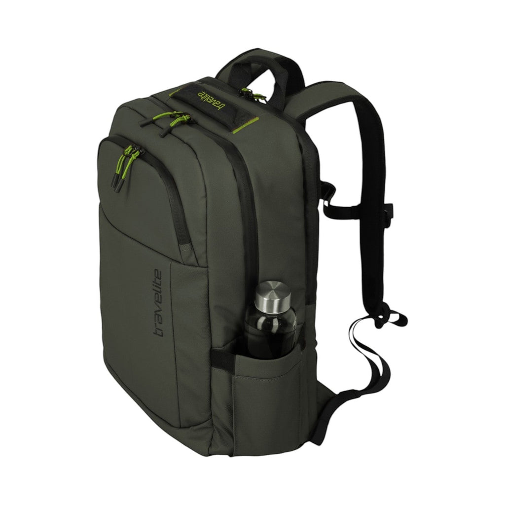 Lieblingstasche Briize Backpack M in dark green, with lime green accents and a water bottle in the side pocket.