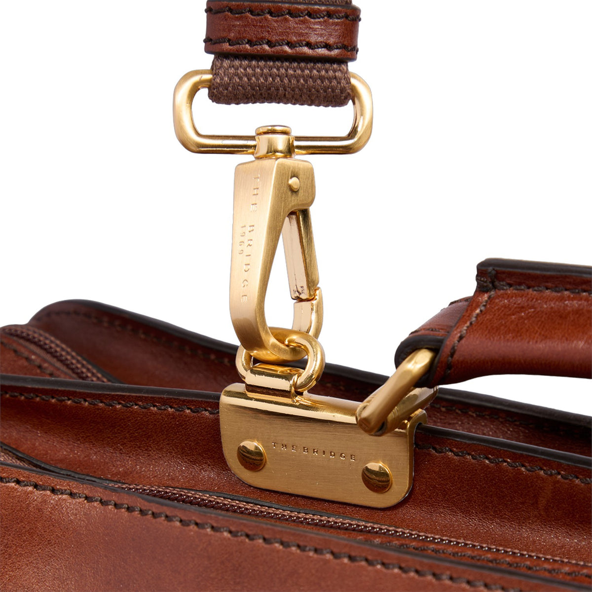 Lieblingstasche brown leather briefcase with gold-tone hardware and embossed logo.