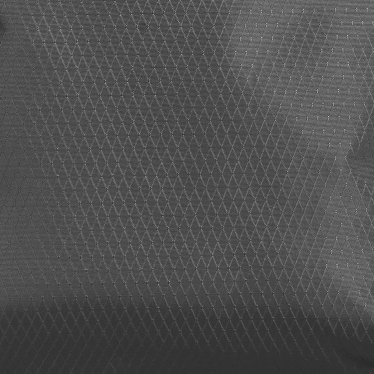 Close-up of the grey diamond-patterned water-resistant fabric used on the Lieblingstasche eoto Small16 daypack.
