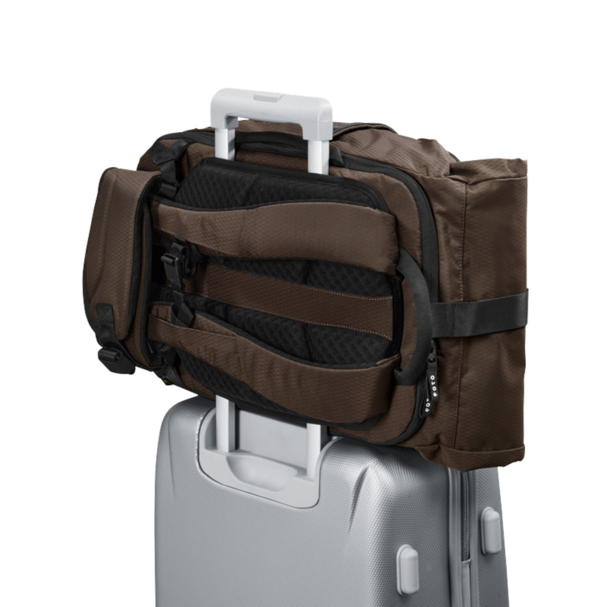 Lieblingstasche eoto Tall41 brown rolltop travel backpack with trolley sleeve attached to a silver suitcase