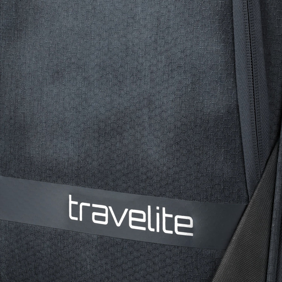 Lieblingstasche KICK OFF trolley suitcase in black with textured fabric and travelite branding detail