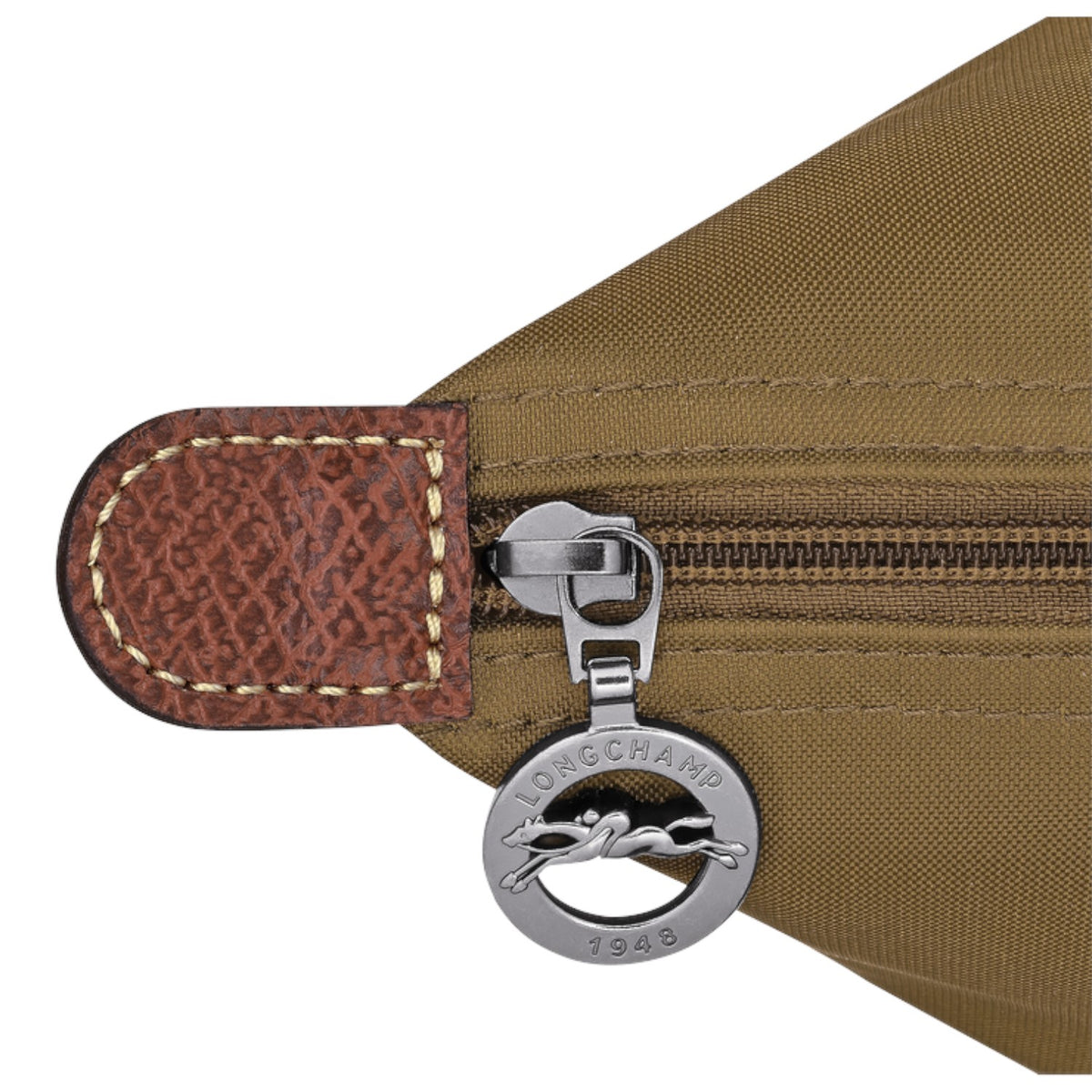Lieblingstasche Le Pliage L handbag detail showing brown nylon fabric, textured leather trim, and silver zipper pull
