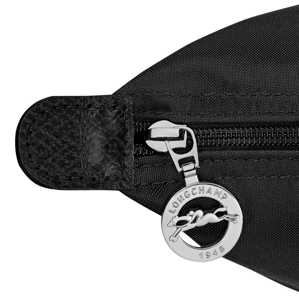 Lieblingstasche Le Pliage One Rucksack in black nylon with leather trim and signature horse logo zipper pull.