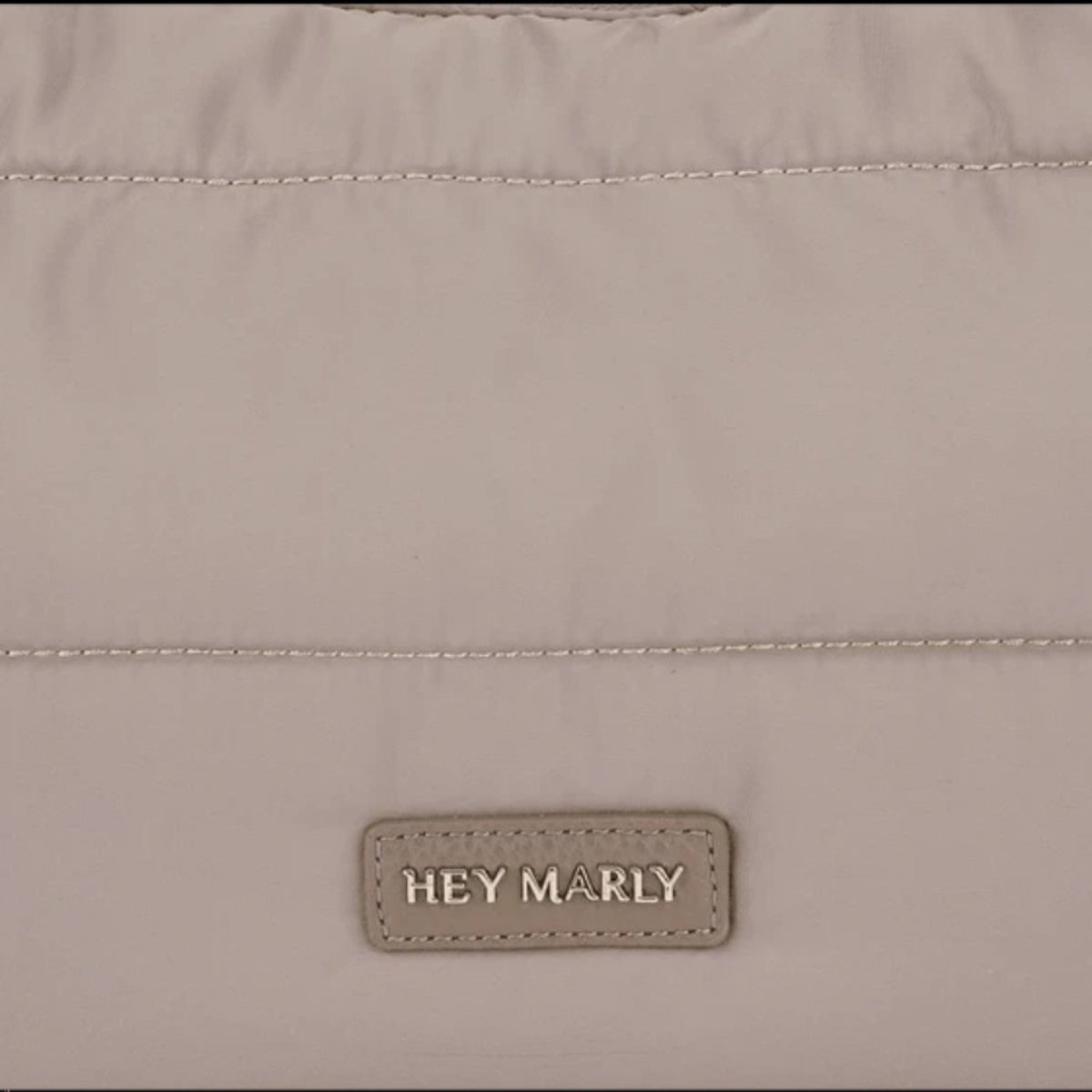Lieblingstasche Lifetime Buddy M bag in taupe with quilted nylon fabric and Hey Marly brand logo patch
