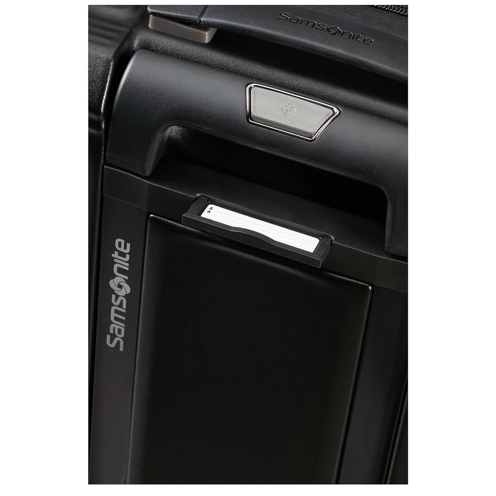 Lieblingstasche Samsonite NUON Spinner suitcase handle and integrated address tag detail in black