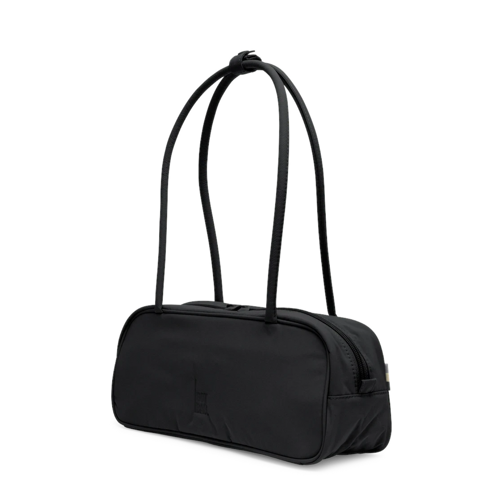 Lieblingstasche Strike Bag Small in black nylon with long shoulder straps and a minimalist rectangular silhouette.