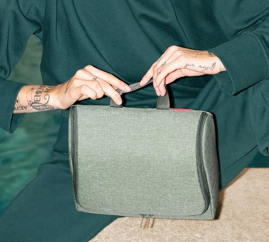 Lieblingstasche Toiletbag XL travel toiletry bag in olive green polyester with a top handle and zip closure